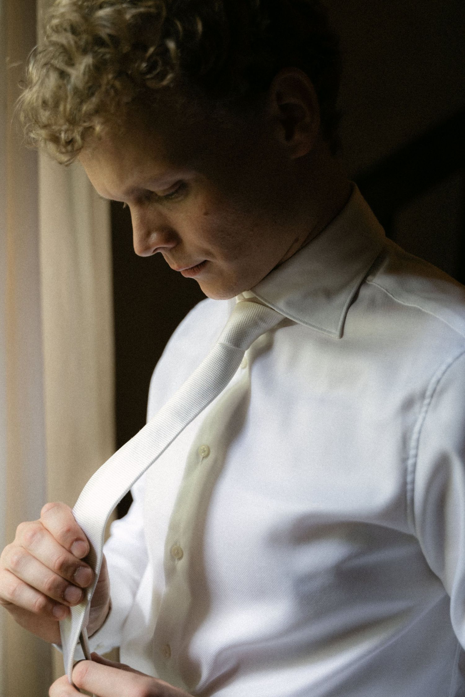 Groom getting ready for his wedding at Borgo del Convento