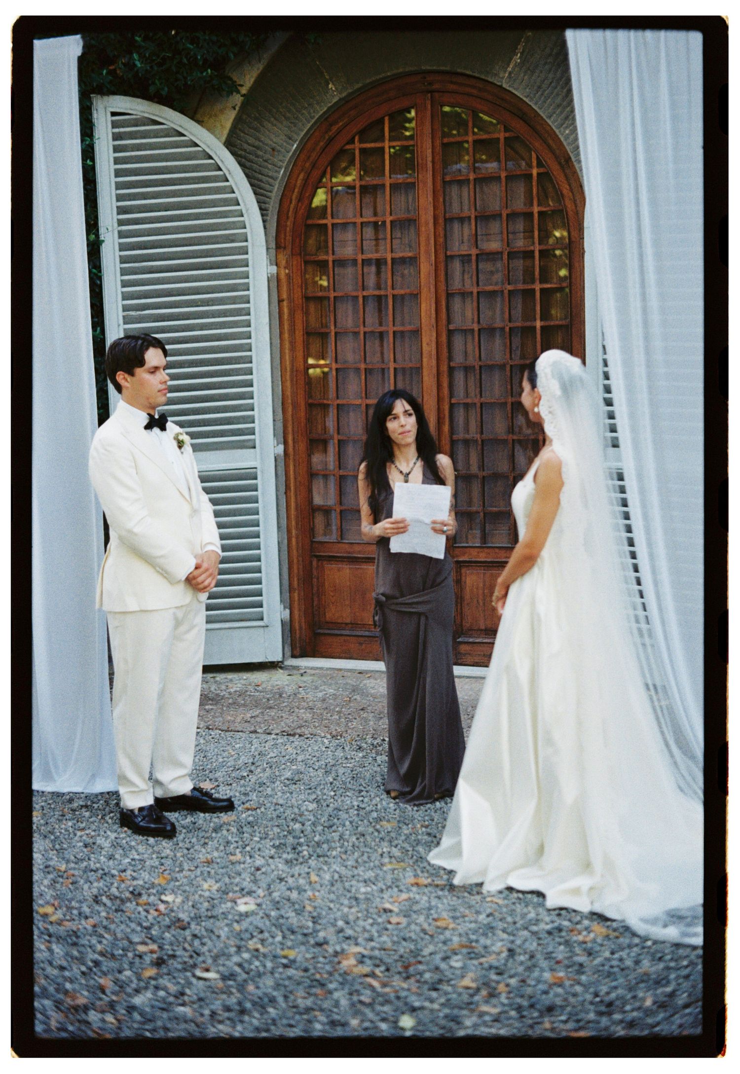 35mm film wedding photography from Lucca, Tuscany, with soft tones, texture, and a timeless wedding atmosphere.