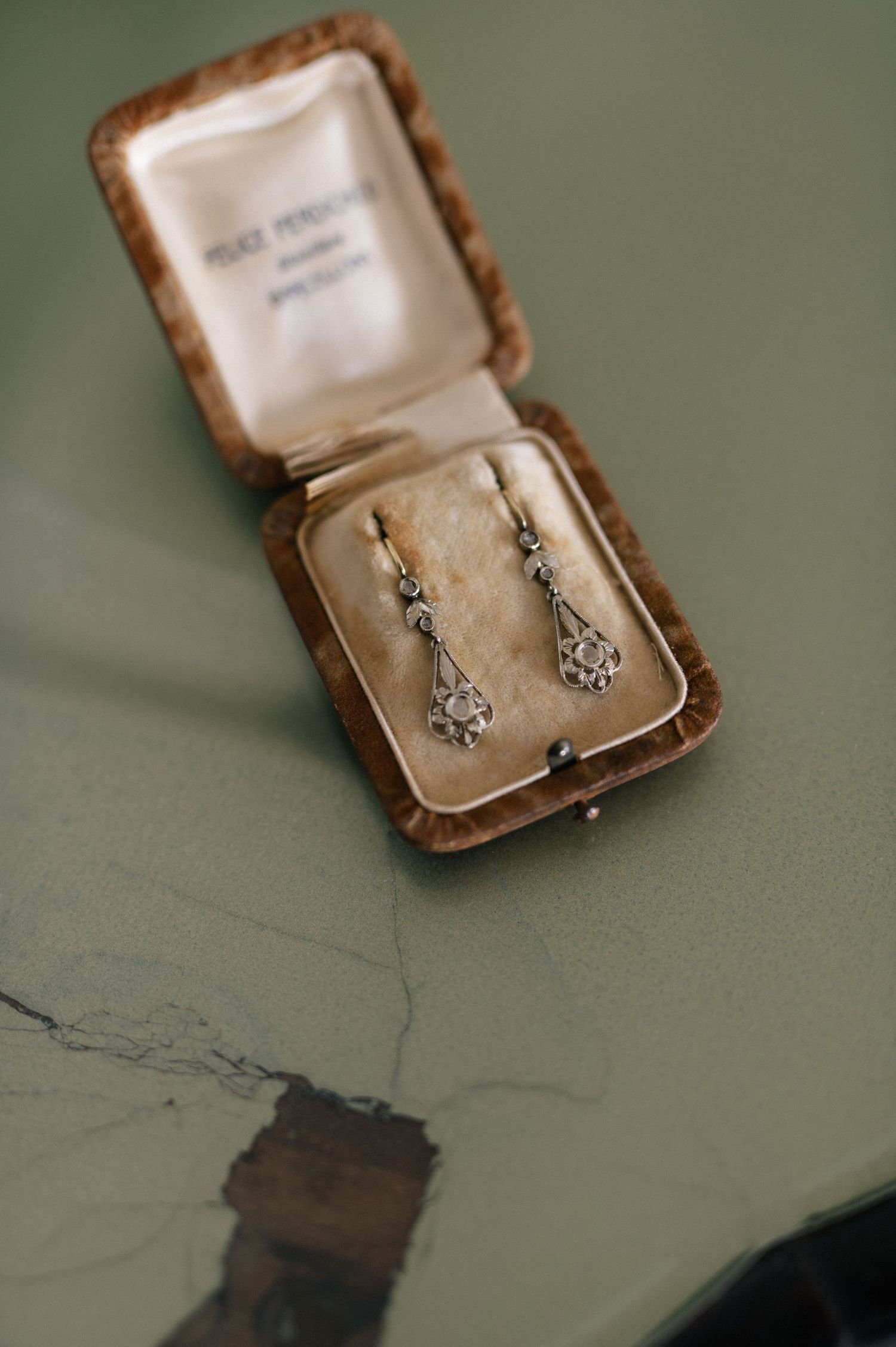 Bridal earrings in a vintage jewellery box