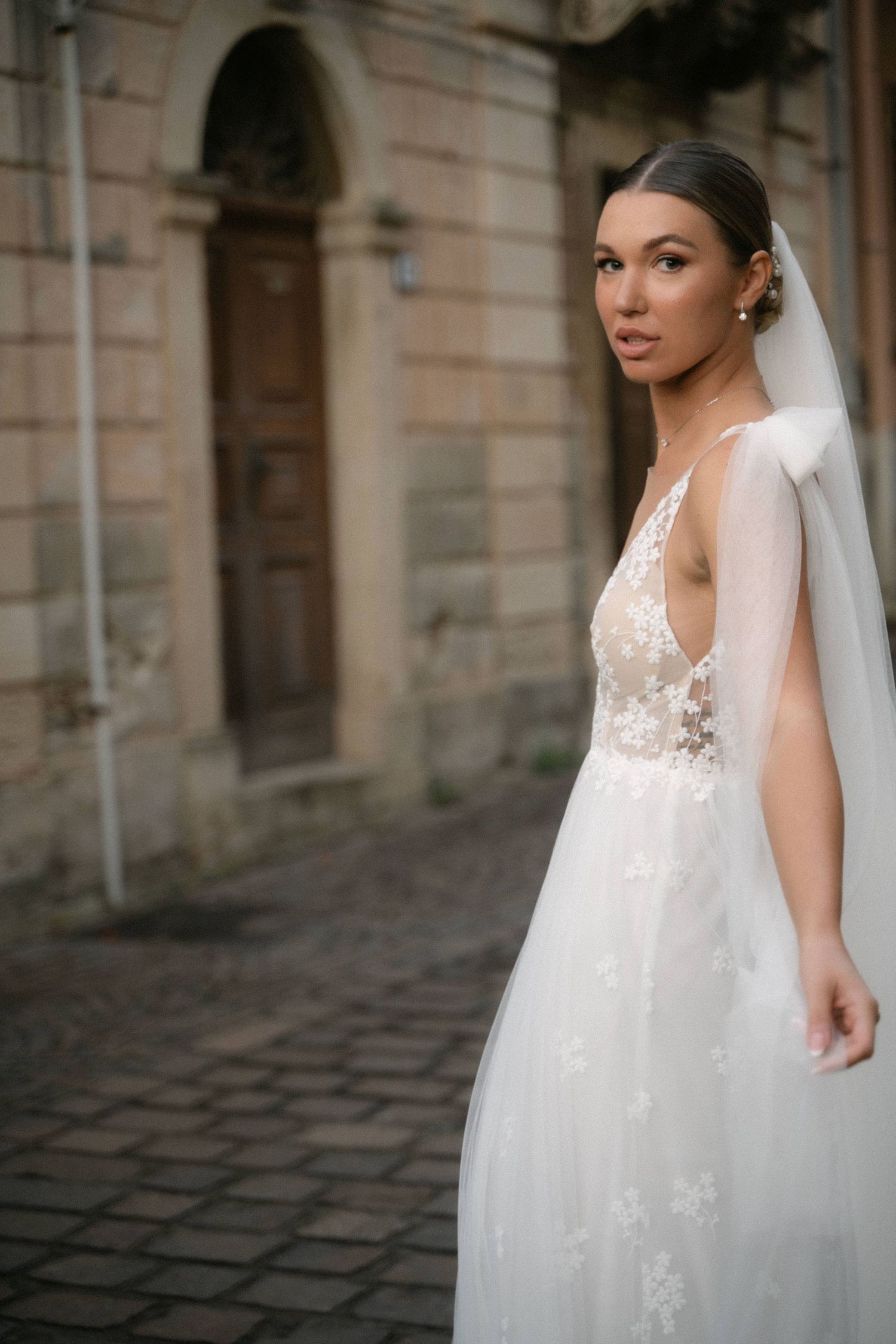 Natural bridal portrait in a historic Sicilian street