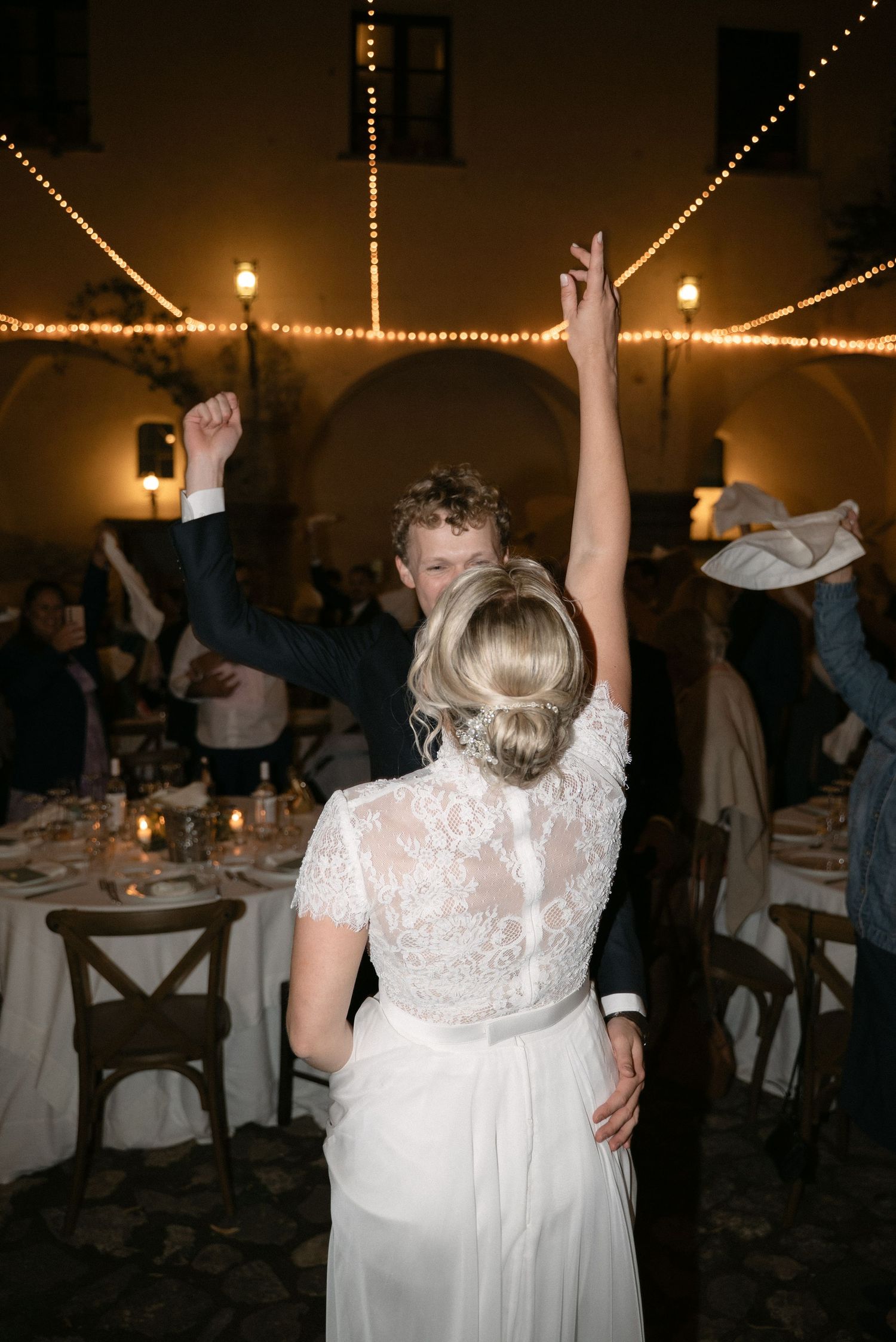 Serena and Paul celebrating with guests during the reception