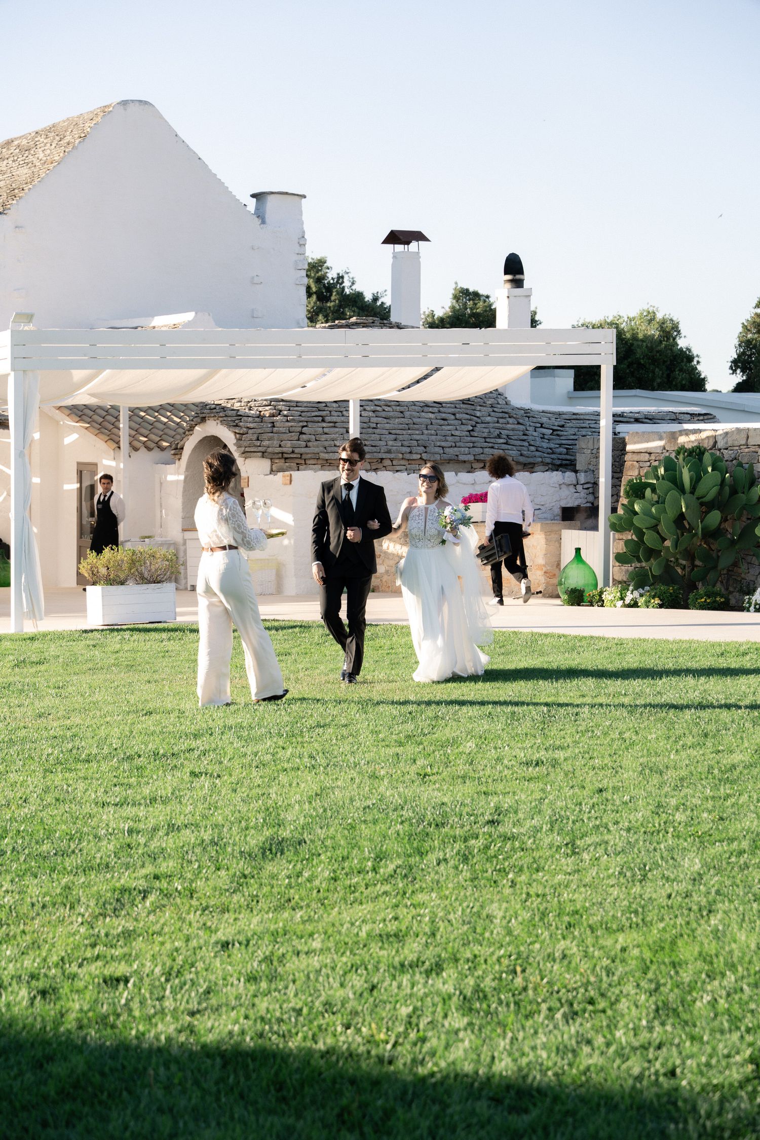 Destination wedding photography in Alberobello, Puglia, captured in digital with a clean and elegant visual style.