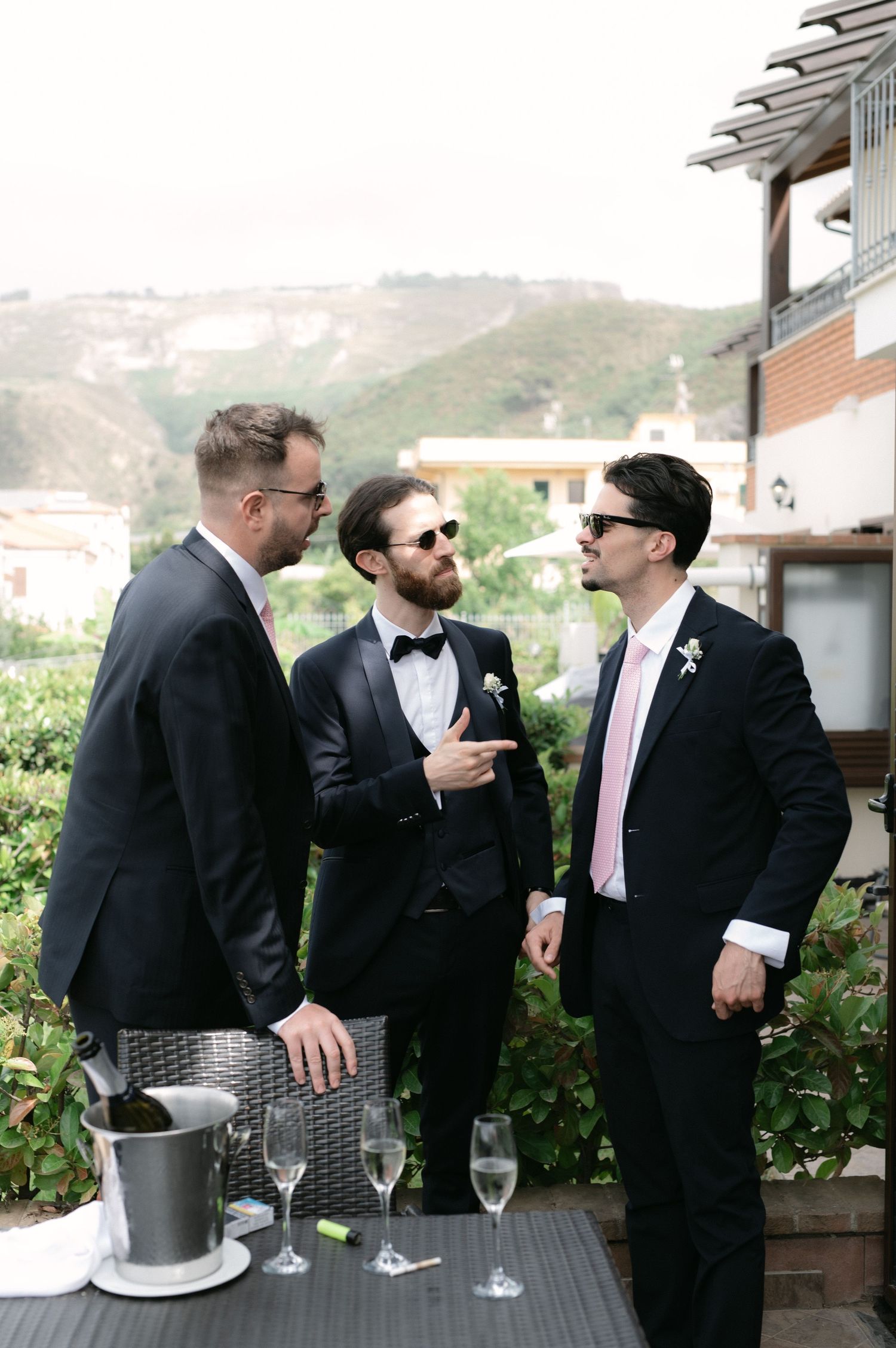 Groom spending time with friends before the ceremony
