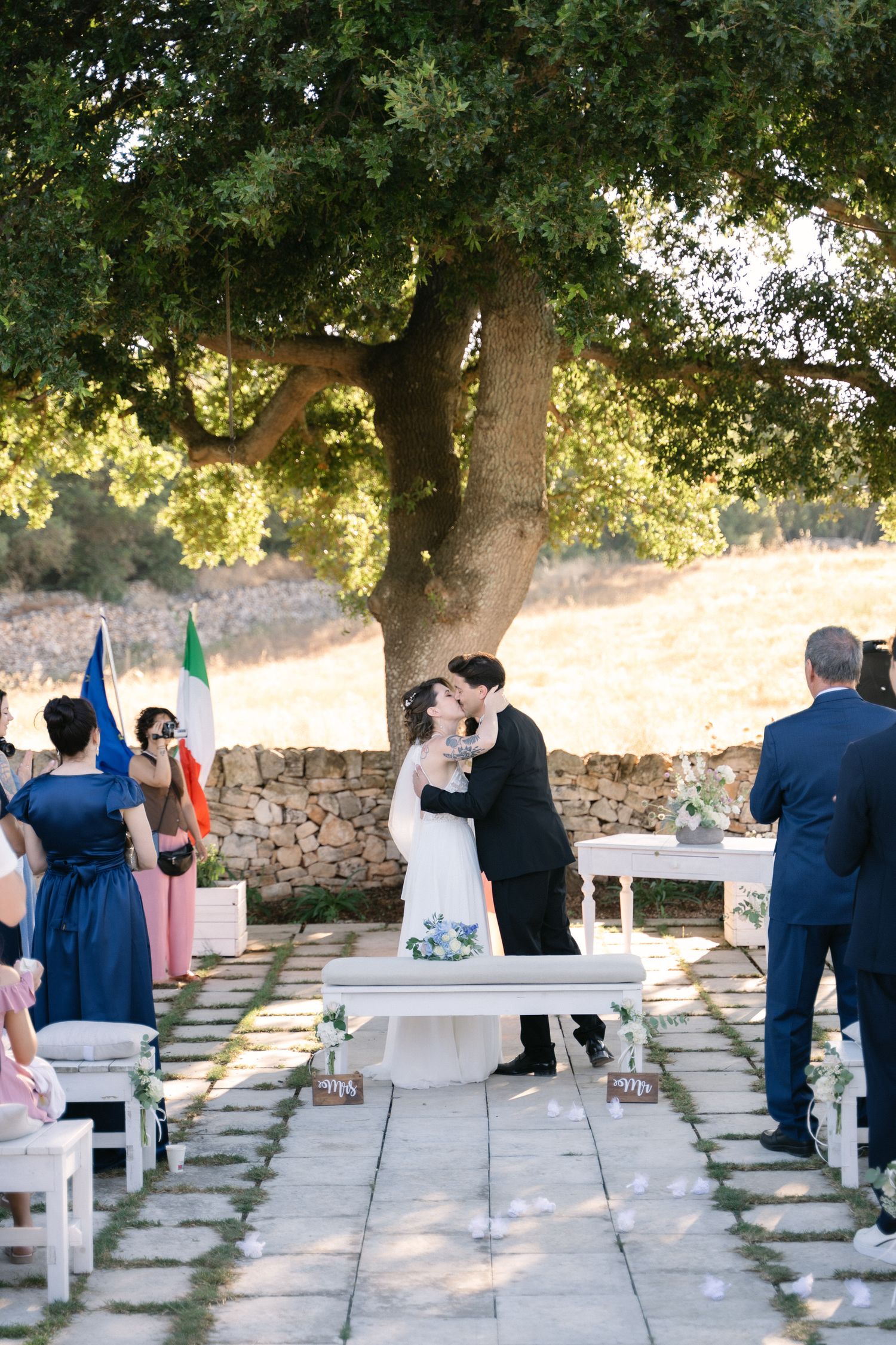 Destination wedding photography in Alberobello, Puglia, captured in digital with a clean and elegant visual style.