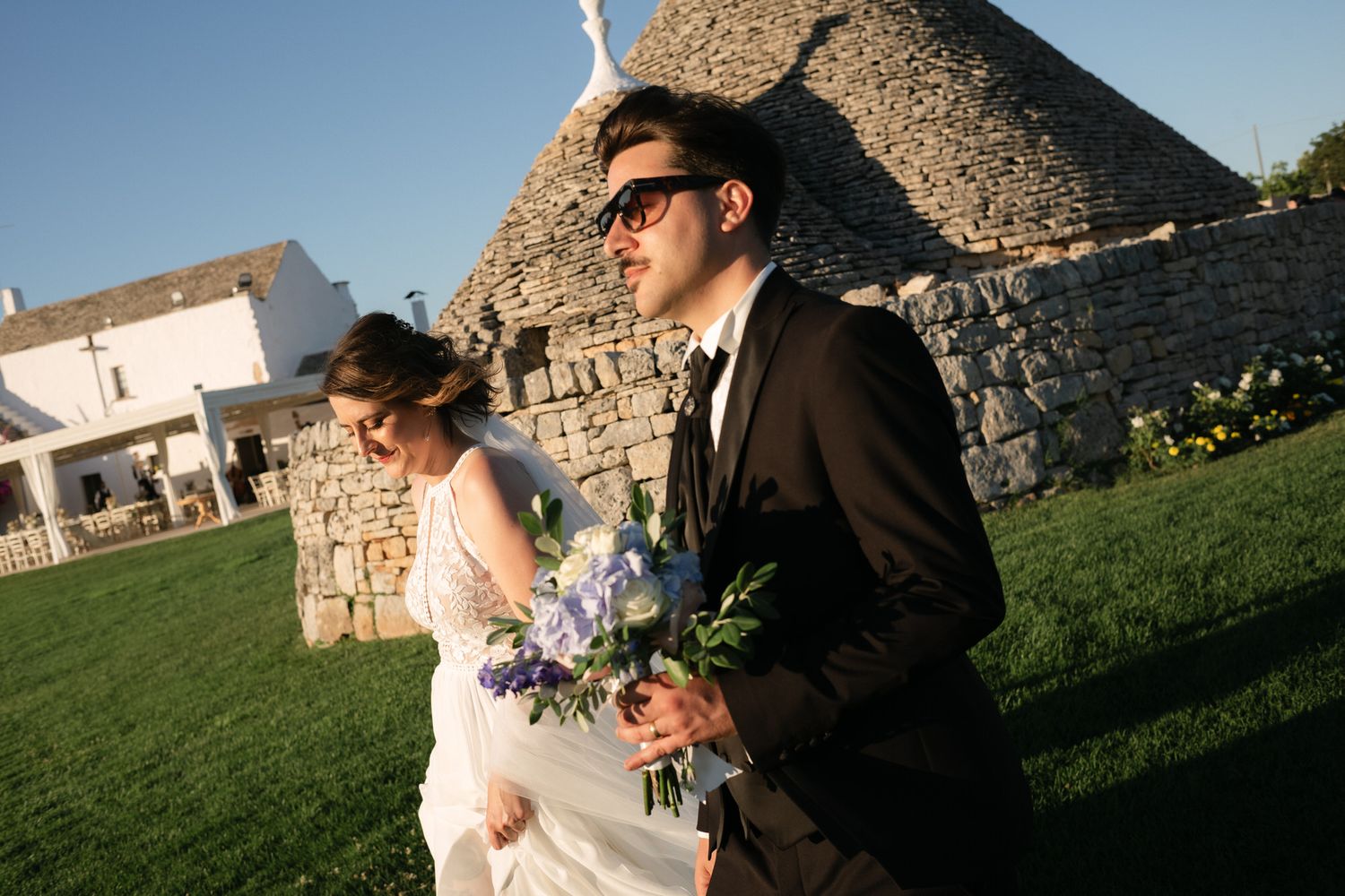 Destination wedding photography in Alberobello, Puglia, captured in digital with a clean and elegant visual style.