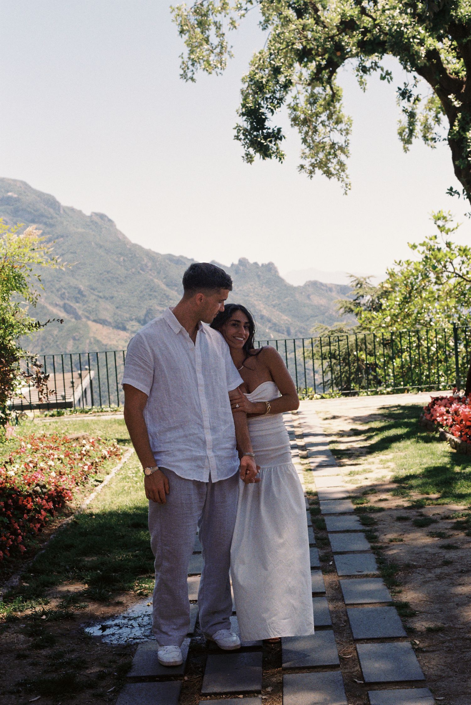 Couple standing together in a Mediterranean garden in Ravello