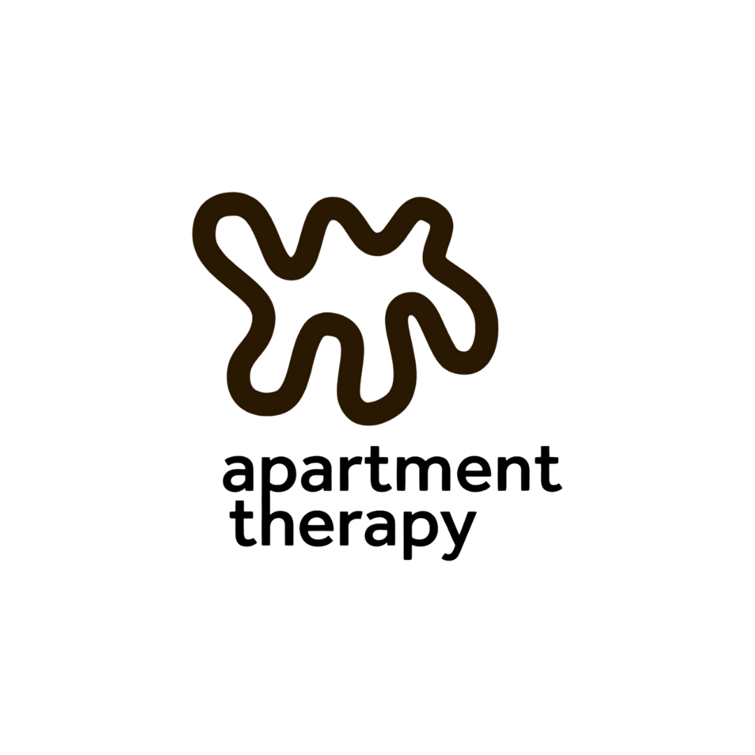 Simple black ink drawing of an abstract squiggle shape on white background.