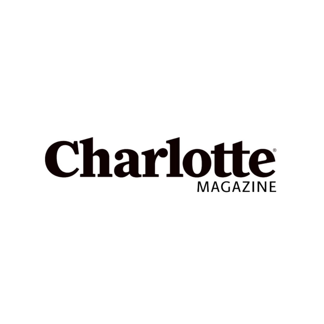 Charlotte magazine logo in dark burgundy text against white background.