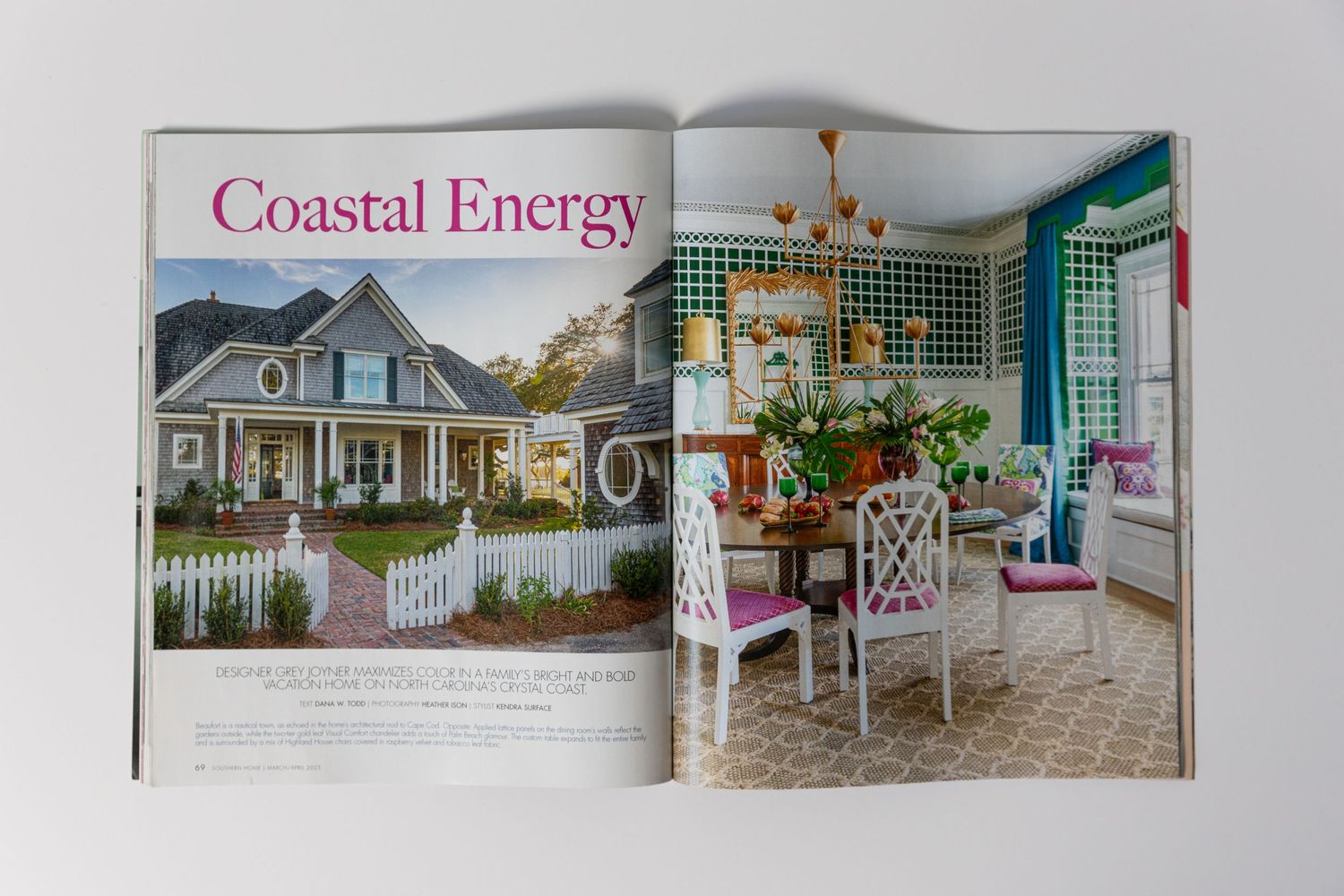 Magazine spread showcasing a coastal home exterior and bright sunroom interior design.