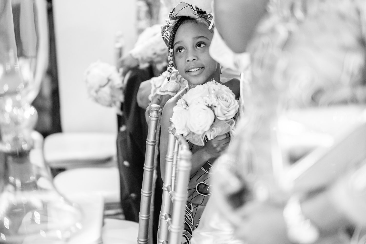 Candid wedding reception moments captured in black and white photography.