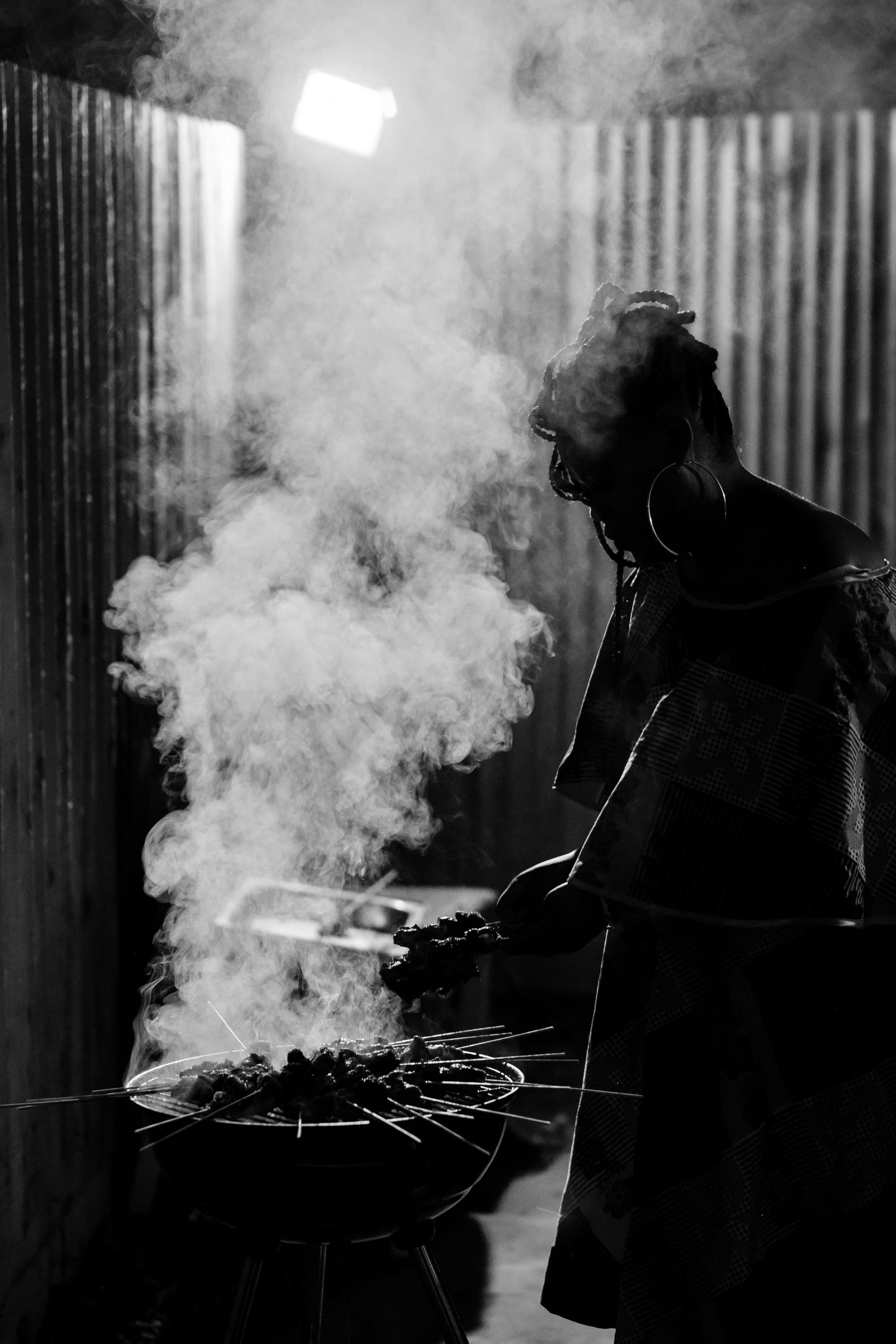 Dramatic silhouette shots with smoke effects creating an atmospheric mood.