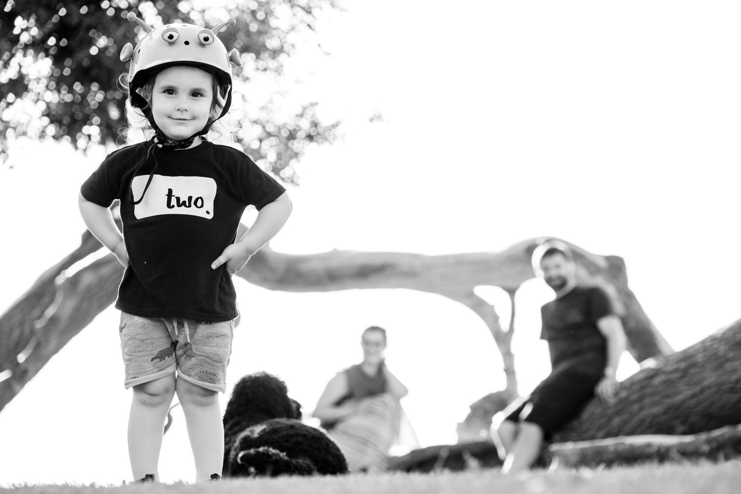 Kids playing in black and white photography series showing joyful moments.