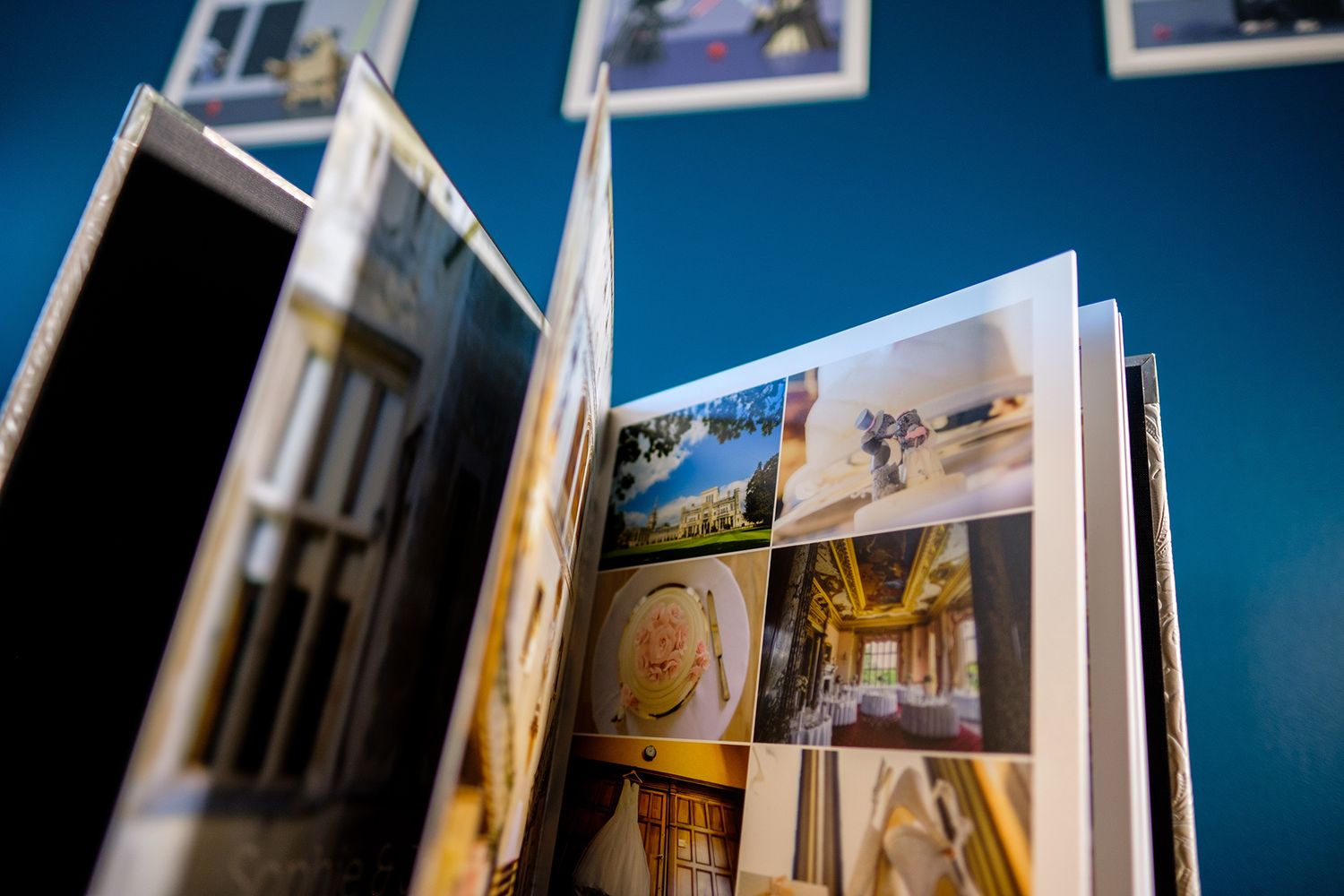 Wedding album pages opened to show professional photography layouts.