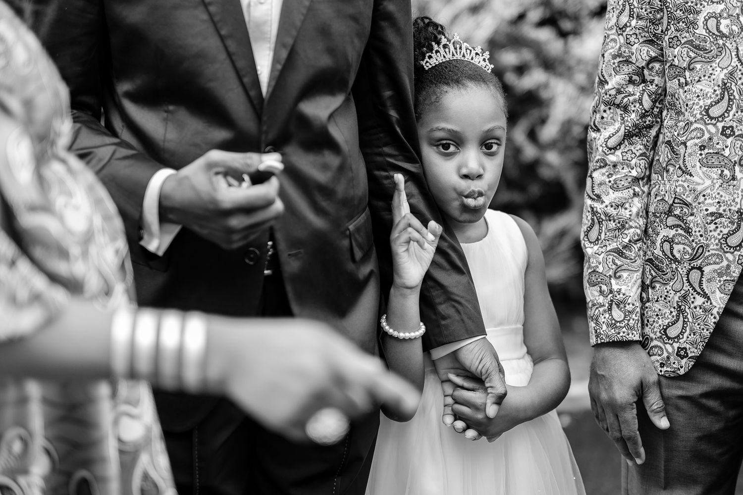 Black and white portrait of children at a formal event.