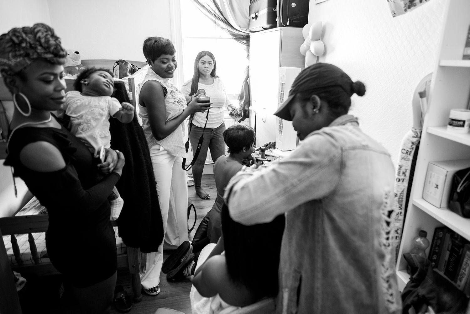 Behind the scenes photography session in a bright studio space.