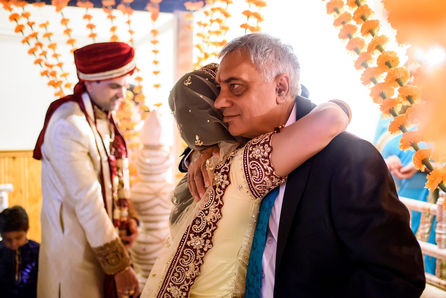 Close up shot of traditional Hindu wedding ceremony rituals being performed.