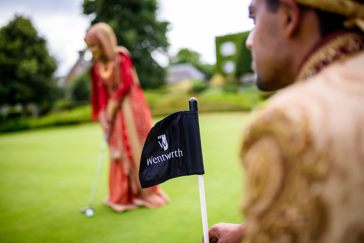 Golf course wedding photo sequence with golf carts on lush green grass.