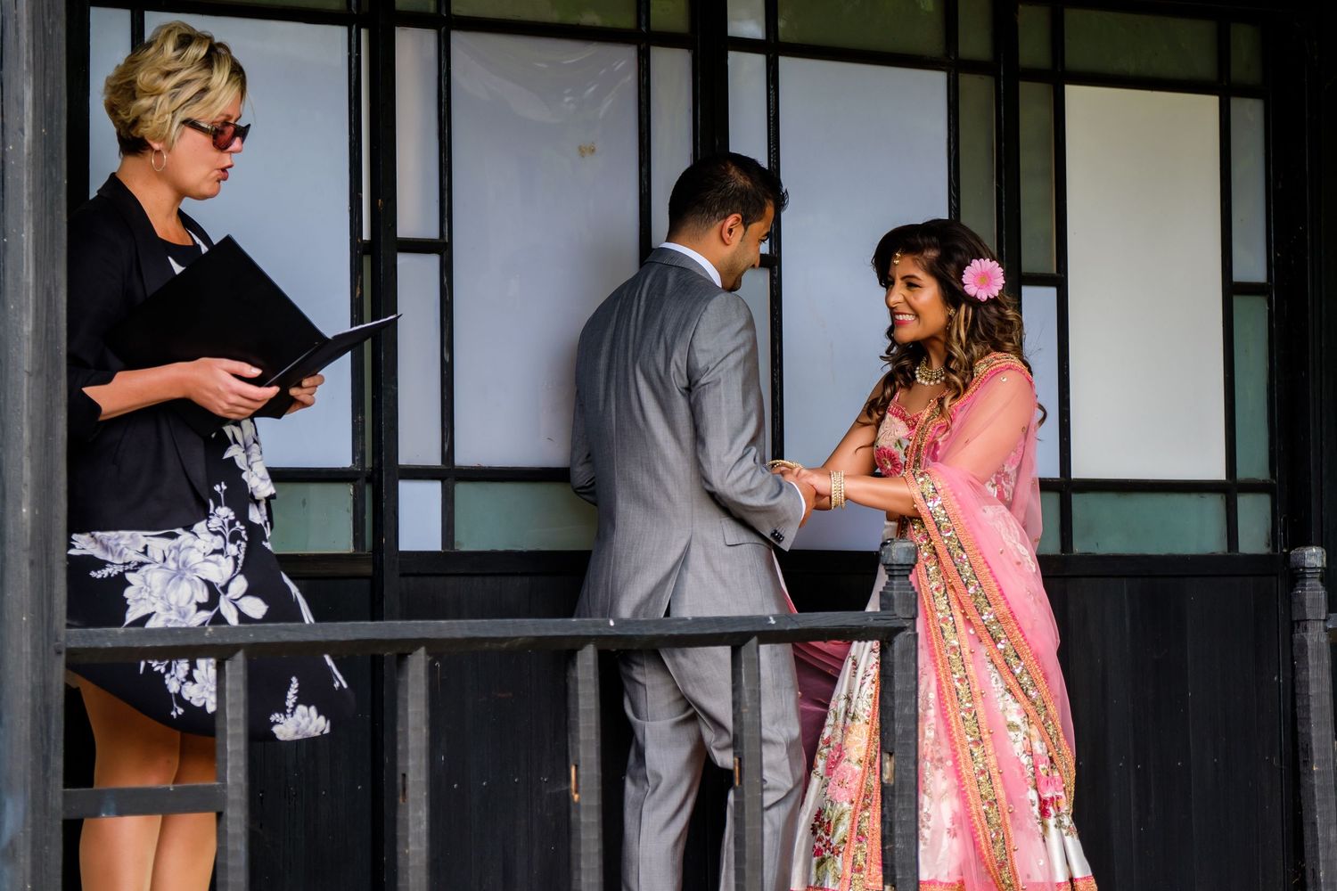 Elegant wedding ceremony taking place on a traditional Japanese-style veranda.
