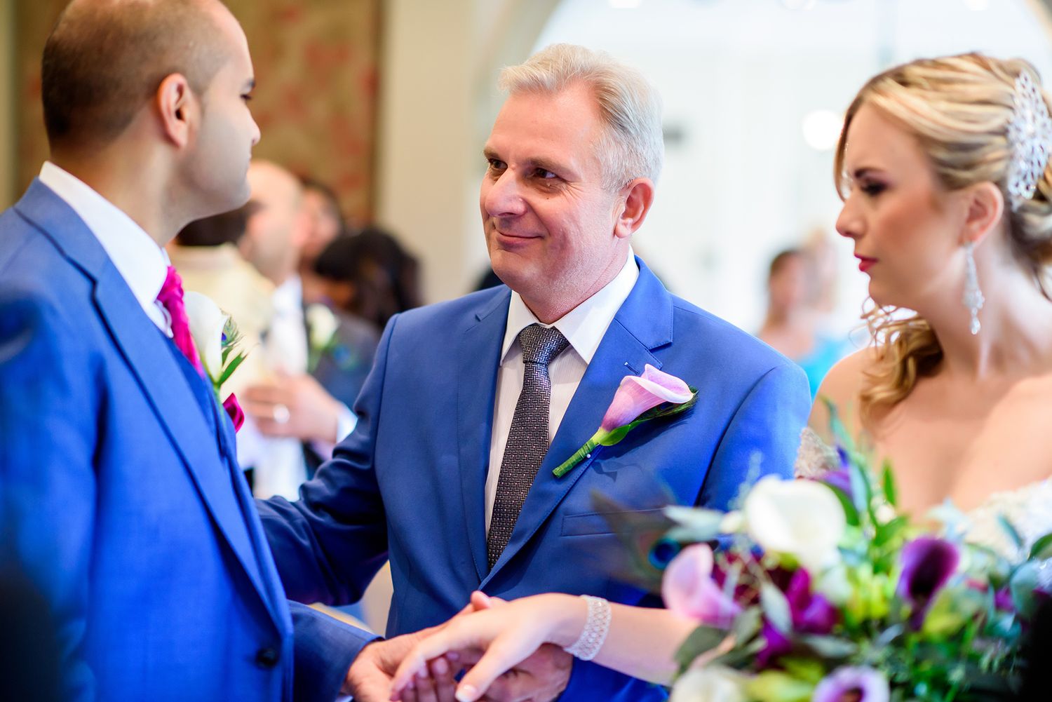A couple shares an intimate dance moment during their wedding celebration.