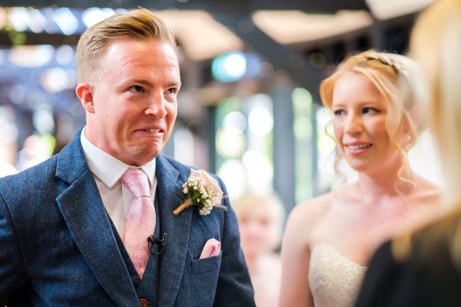 Candid moments captured during a wedding reception with guests interacting.