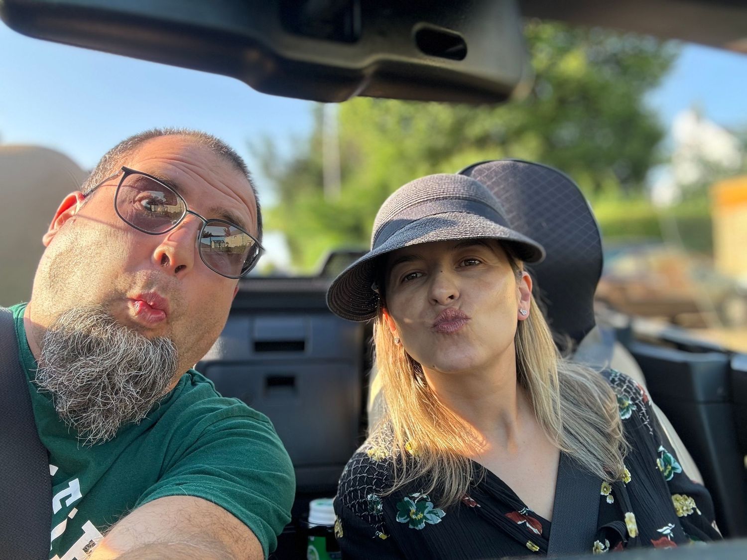Series of casual car selfies showing people enjoying a road trip together.