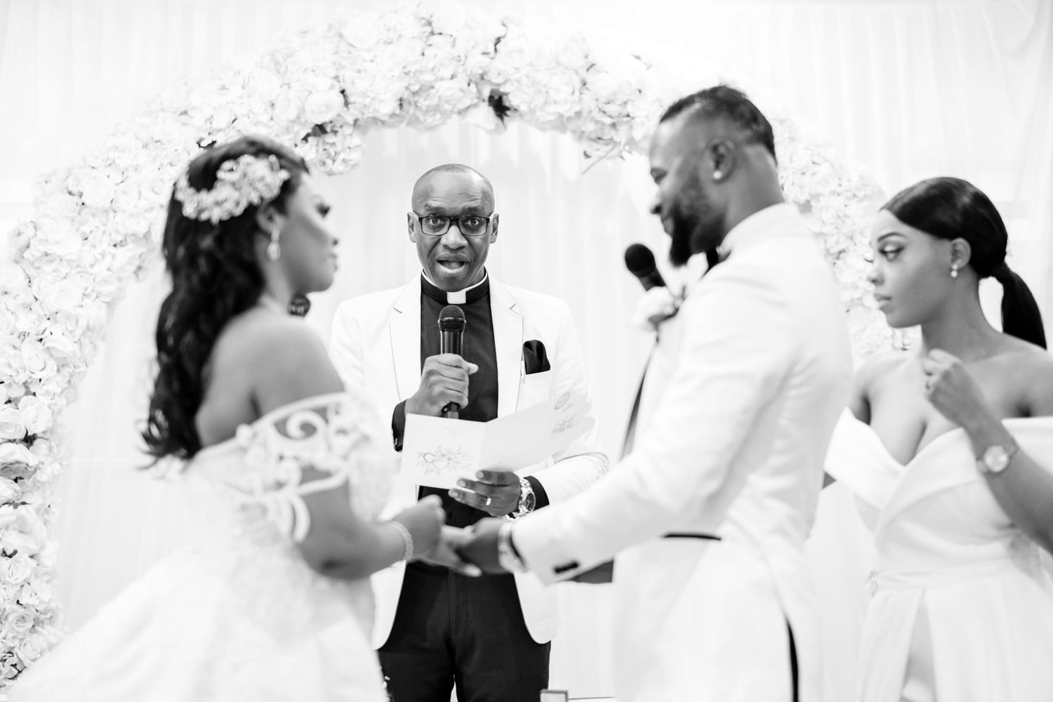 Black and white photo montage capturing candid wedding reception celebration moments.