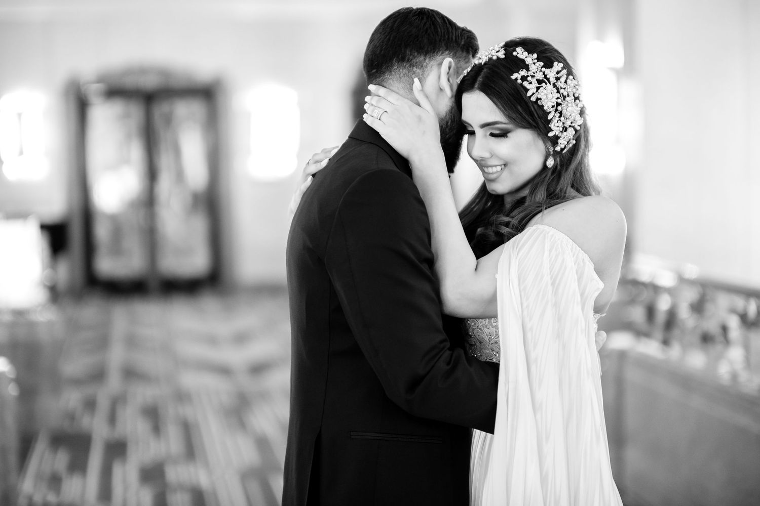 A black and white wedding photo montage showing intimate moments between a couple throughout their special day.
