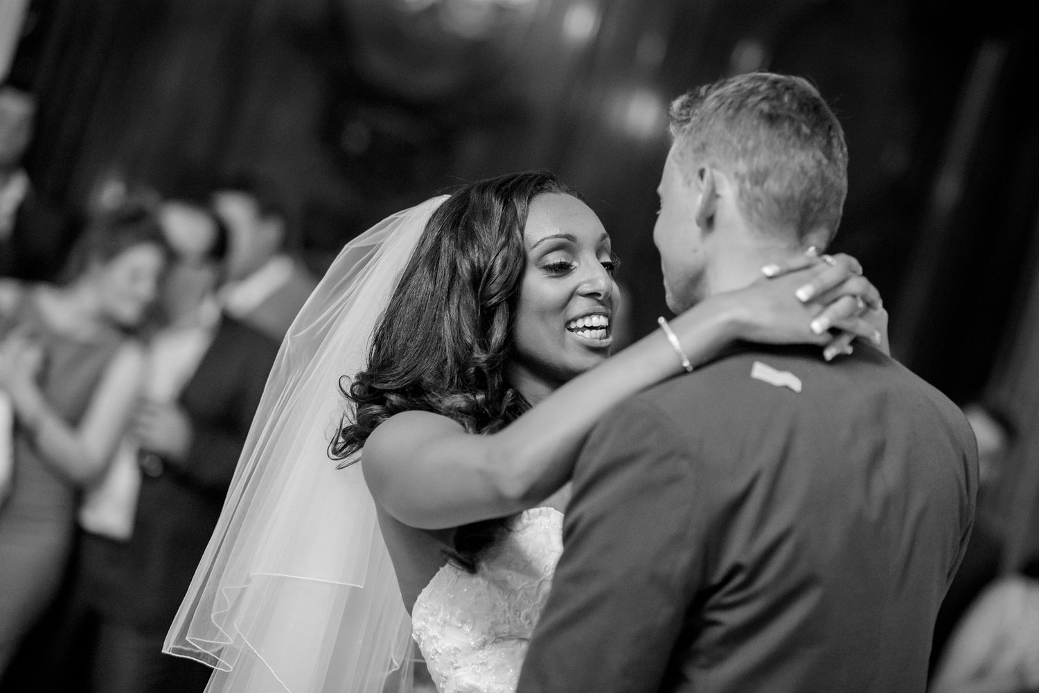Black and white photo capturing an intimate moment during the wedding first dance.