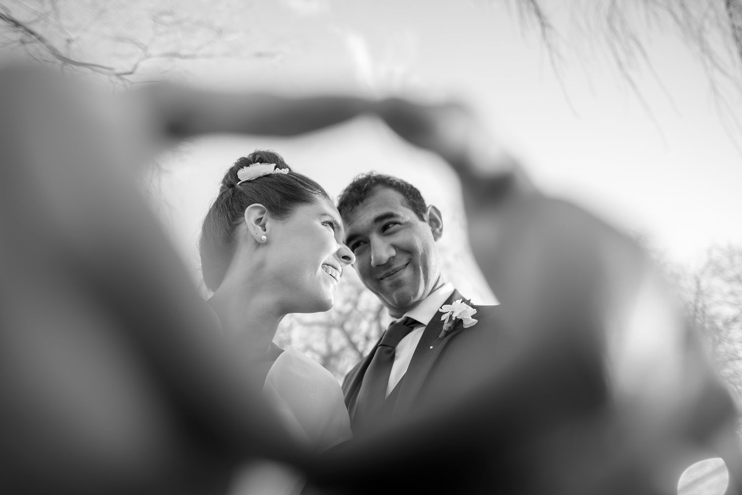 Artistic black and white closeup shots of tender wedding moments.