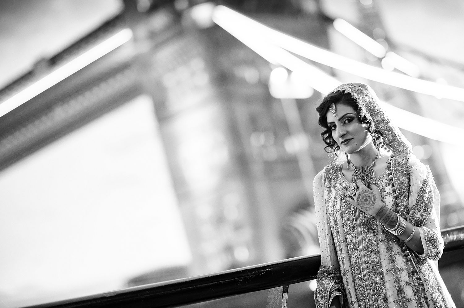 Black and white artistic portrait shot with soft focus and dramatic lighting.