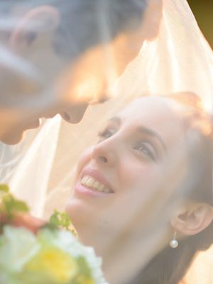 Ethereal bridal portrait with soft natural lighting and dreamy atmosphere.
