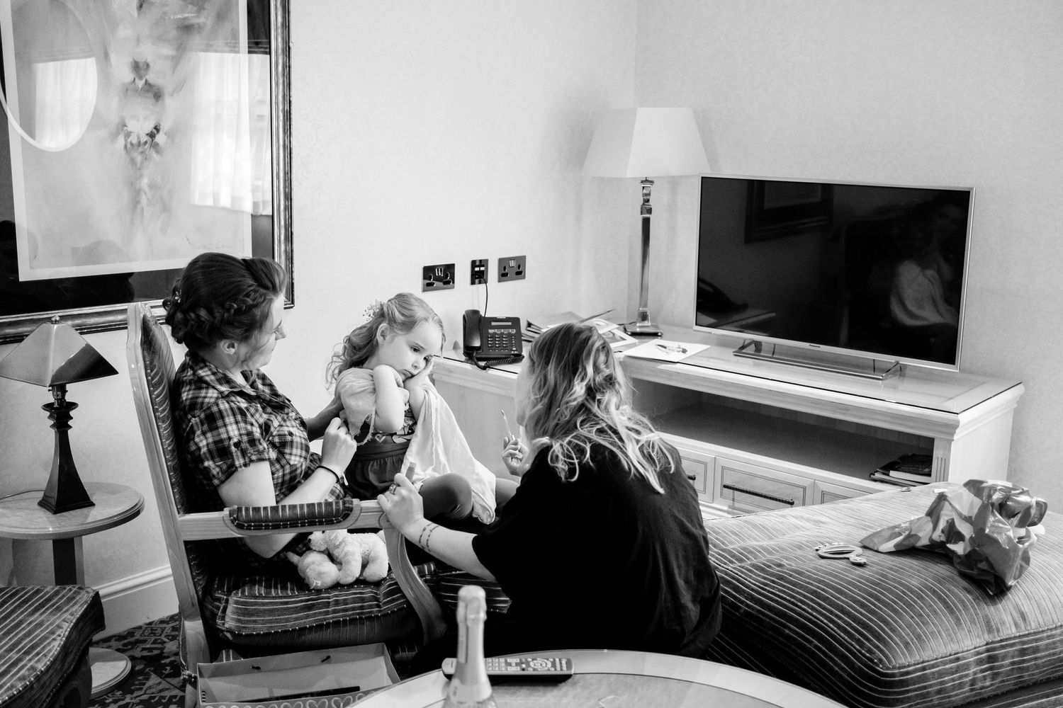 Series of monochrome images showing modern living spaces and bedroom interiors in minimalist style.