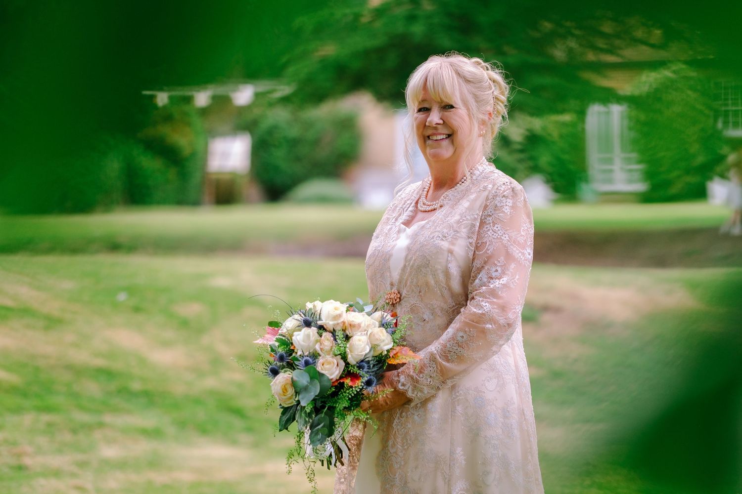 A series of romantic outdoor wedding photos showing a couple celebrating in a lush green garden setting.