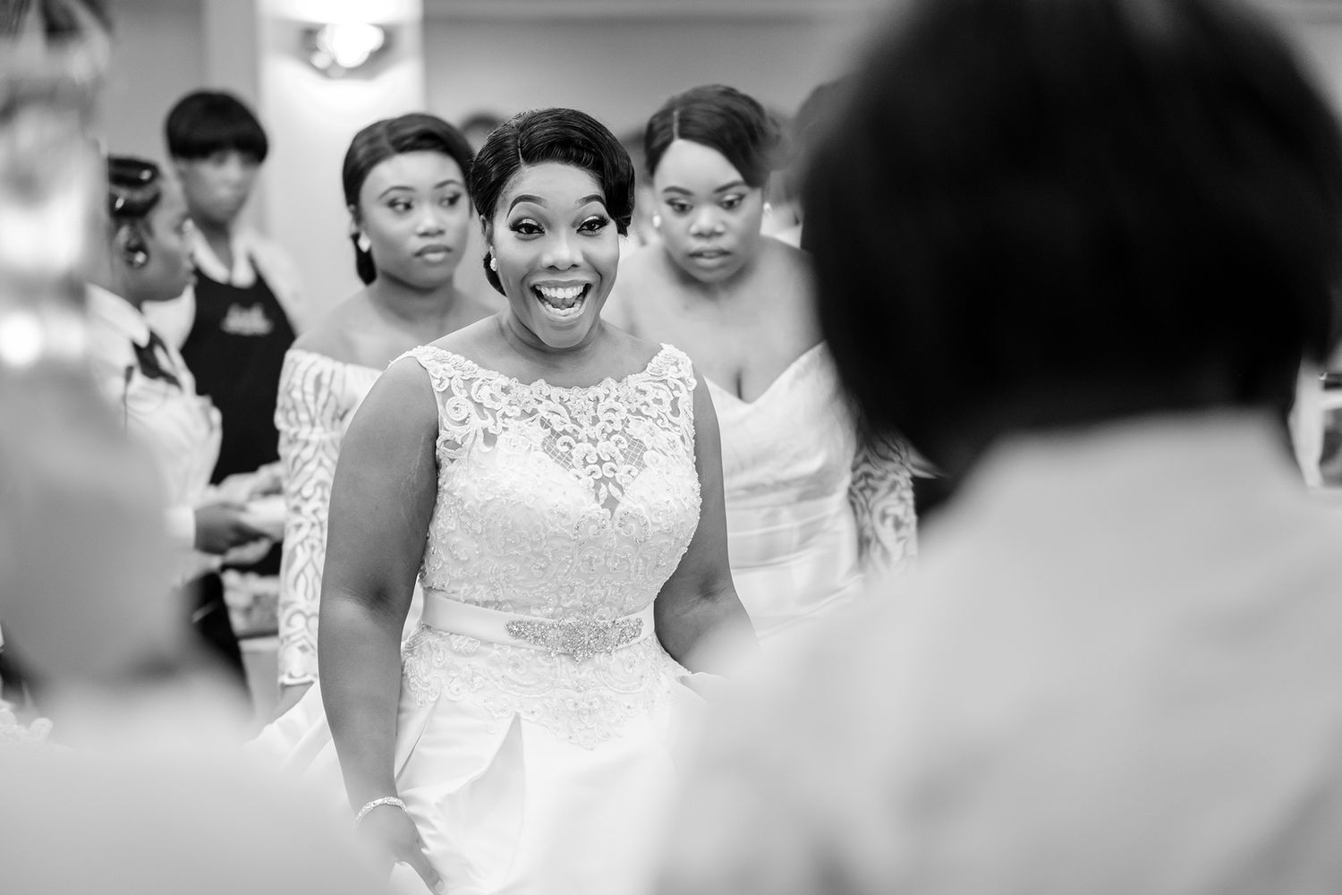 Joyful wedding guests sharing an emotional moment during the reception.