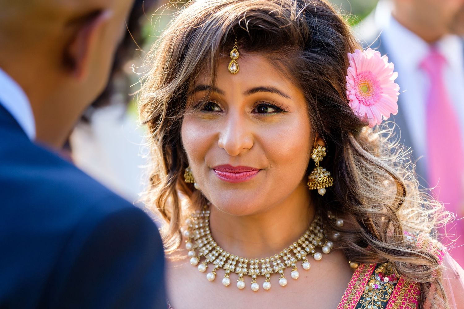 Wedding ceremony featuring ornate jewelry and traditional cultural elements.