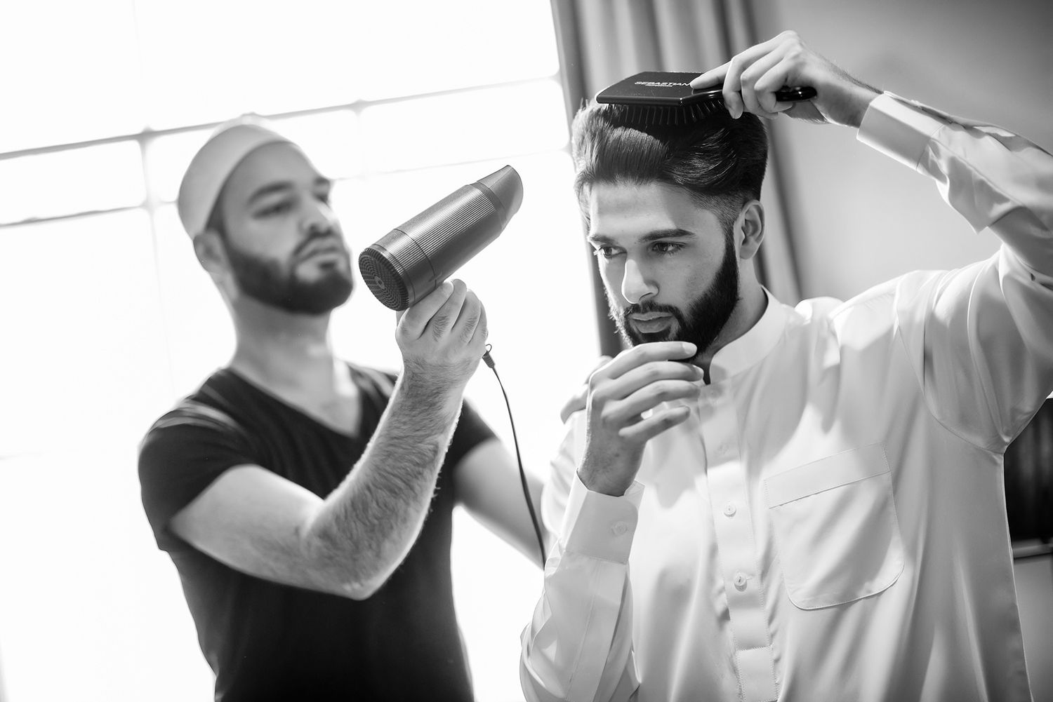 Series of candid getting ready moments captured in monochrome.