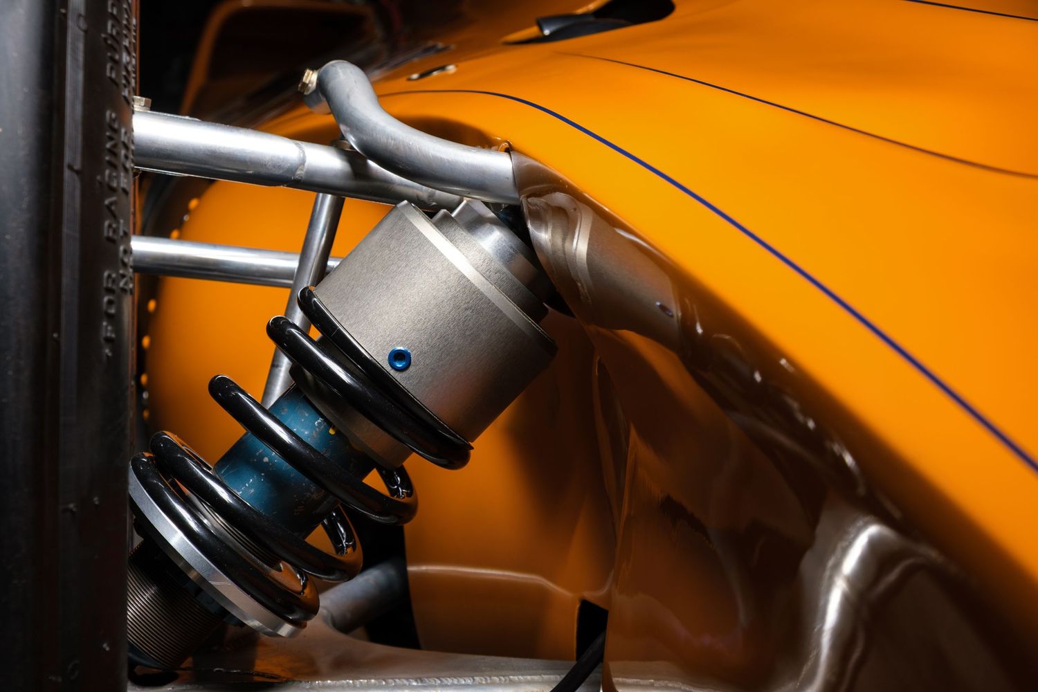 Close-up shots of various audio equipment and musical instruments illuminated in warm orange lighting.
