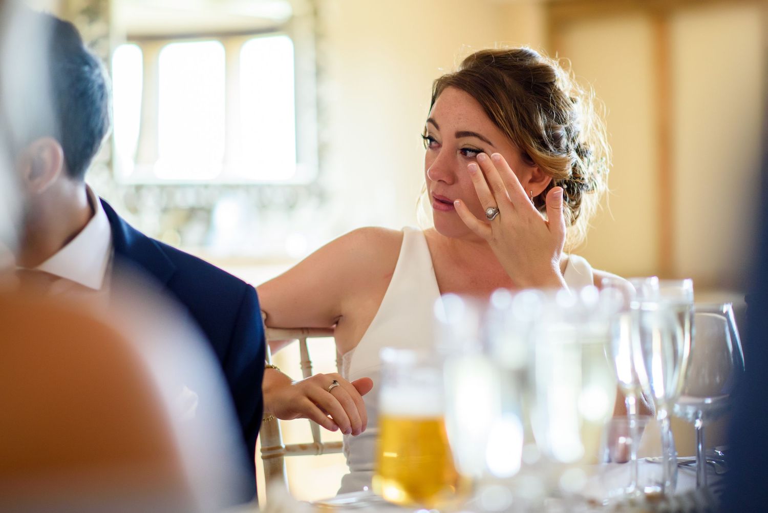 Candid reception moments with guests in formal attire.