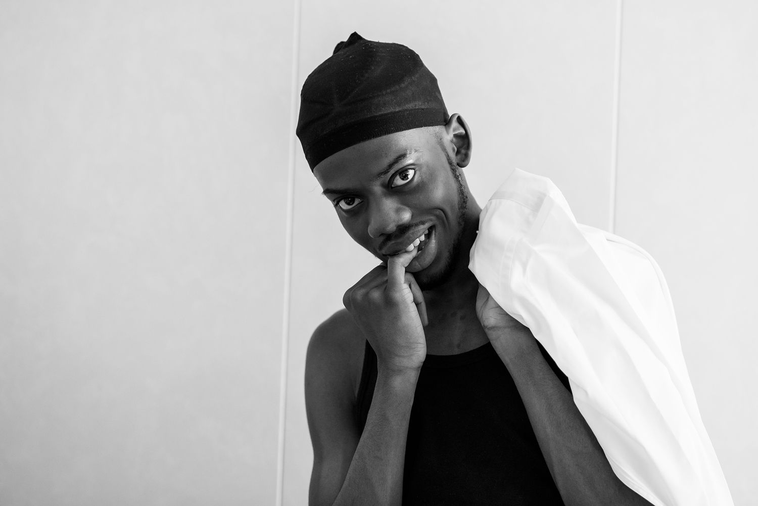 Black and white artistic composition showing emotional expressions and gestures.