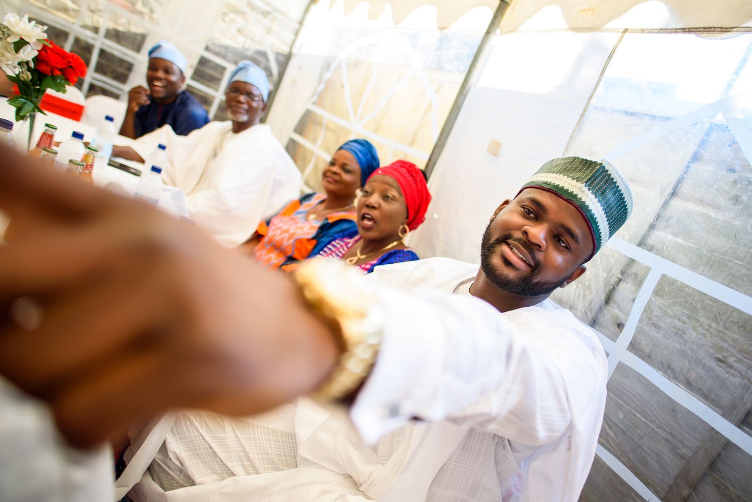 Candid moments of celebration captured at a lively social gathering.