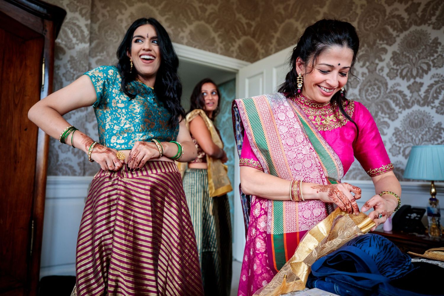 Festive scene showing traditional Indian wedding attire and preparations.