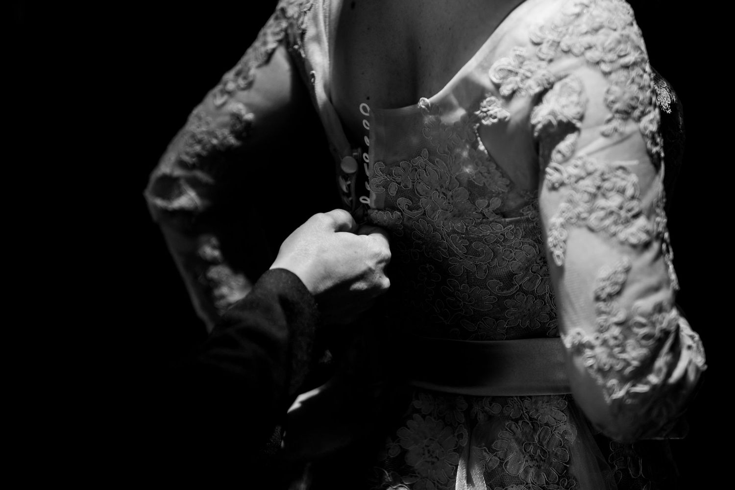 A series of black and white photographs showing a person sculpting clay or similar material into various artistic forms.