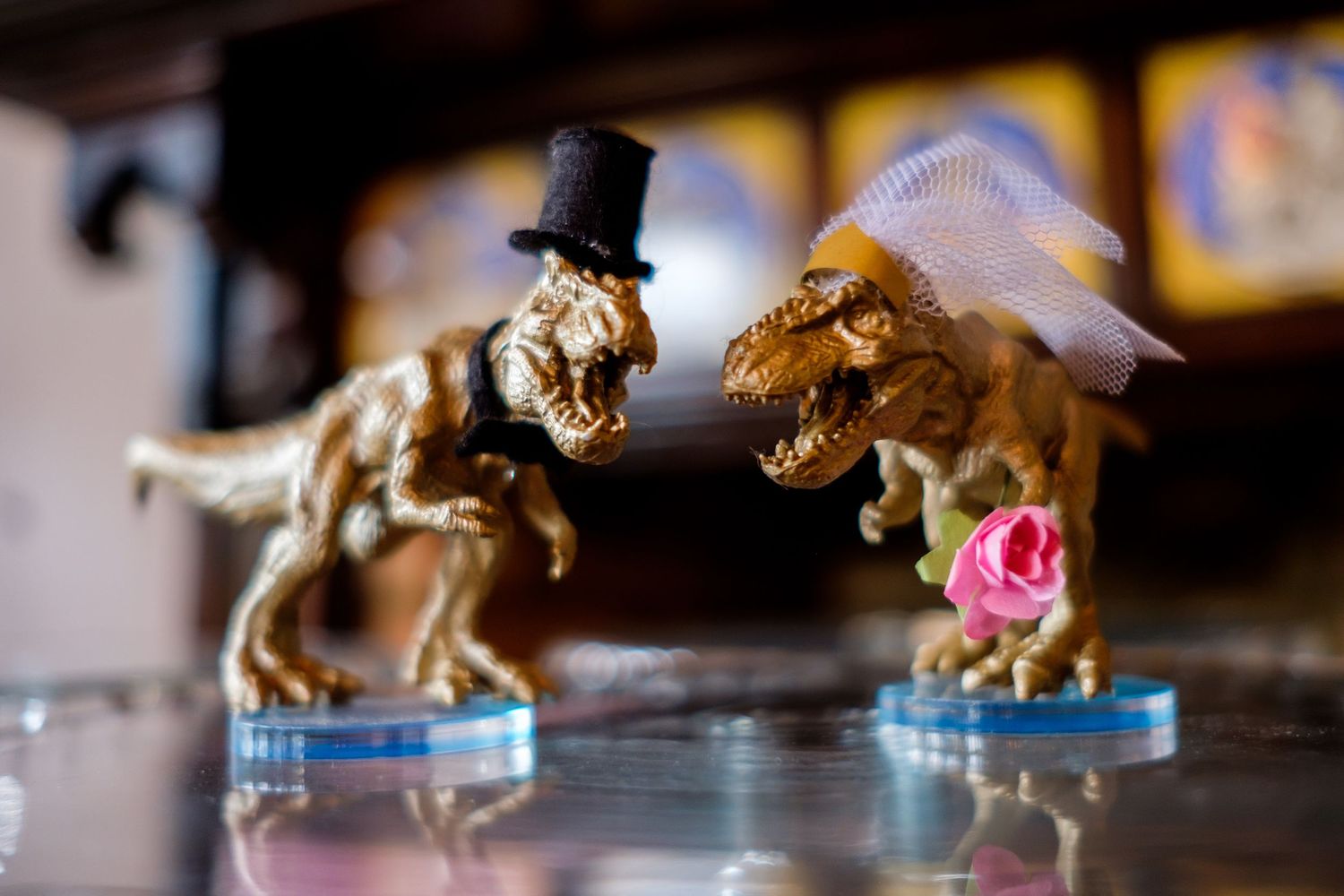 Decorative golden animal figurines arranged on a display surface.