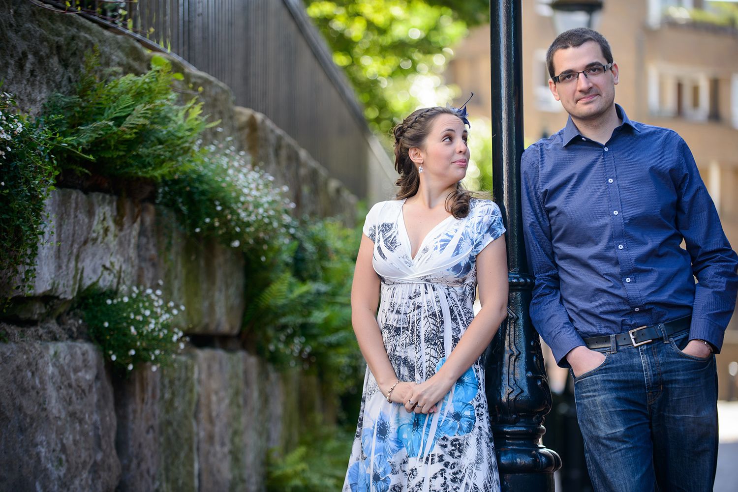 Romantic garden portrait with lush greenery and natural lighting.