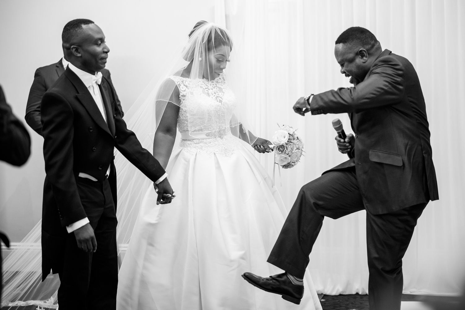 Dynamic black and white captures of joyful wedding ceremony moments.