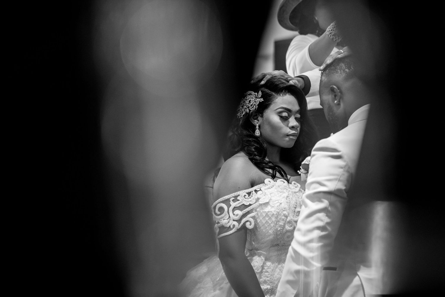 Black and white artistic shots of wedding reception dance moments.