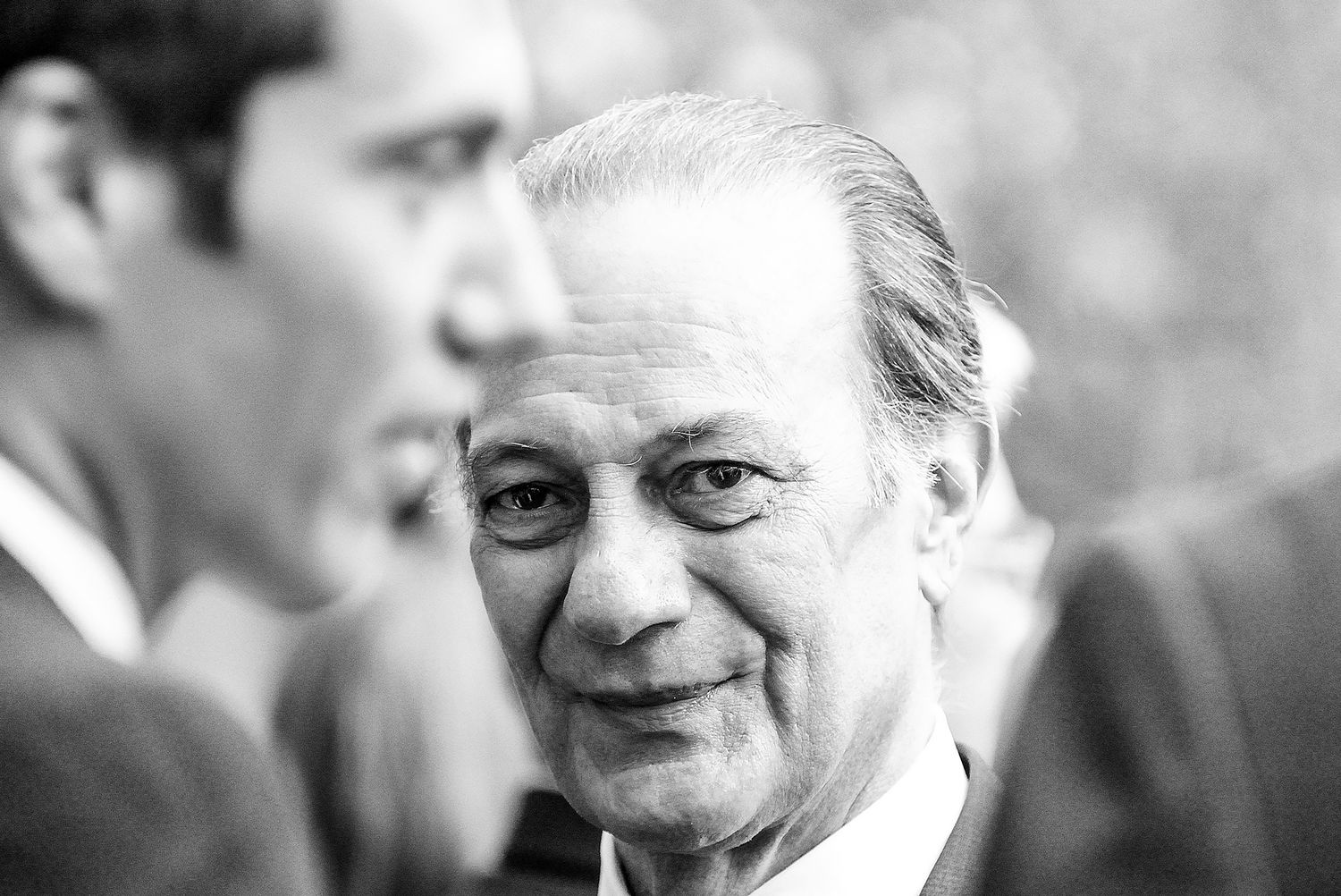 Black and white portrait shot showing joyful candid expressions.