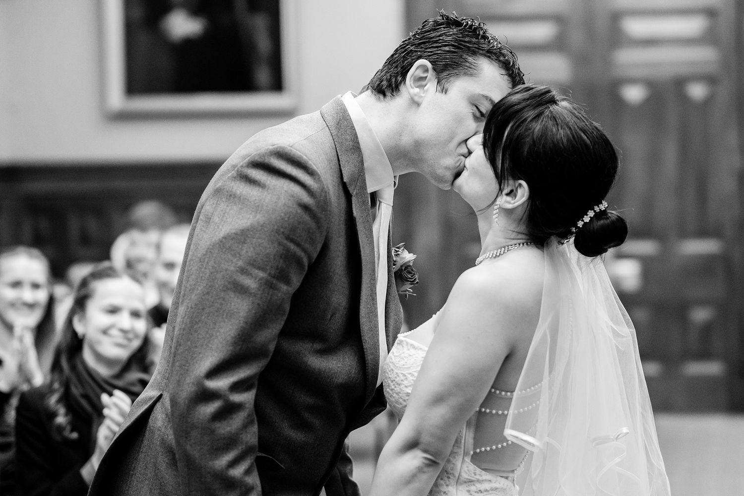 Tender wedding ceremony moments photographed in classic black and white style.
