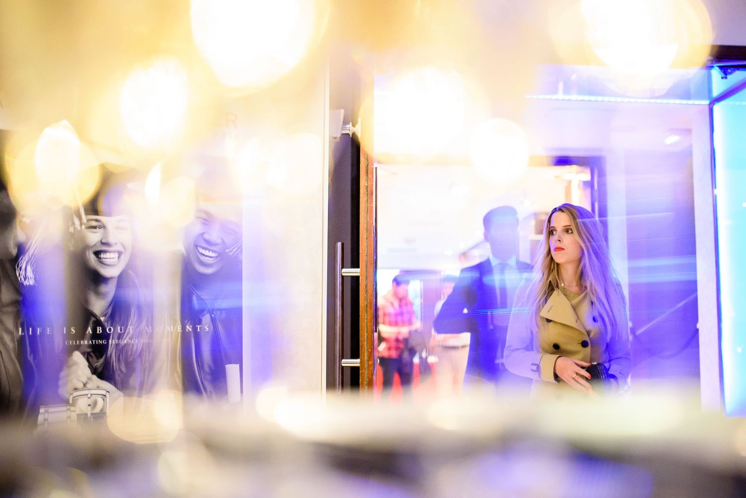 Blurred bokeh lights creating dreamy atmosphere at evening event.