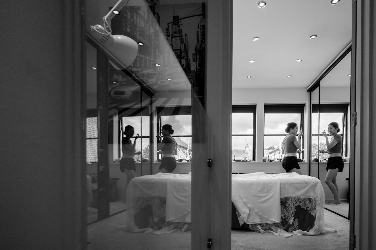 Modern hotel suite interior with floor to ceiling windows and ocean views.